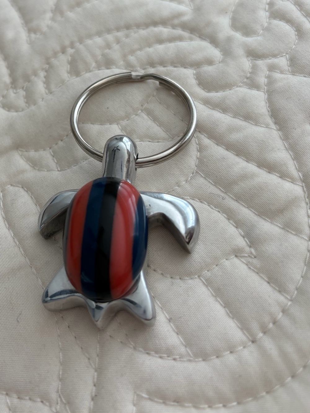 Adorable Turtle Keychain with Blue and Red Striped Shell